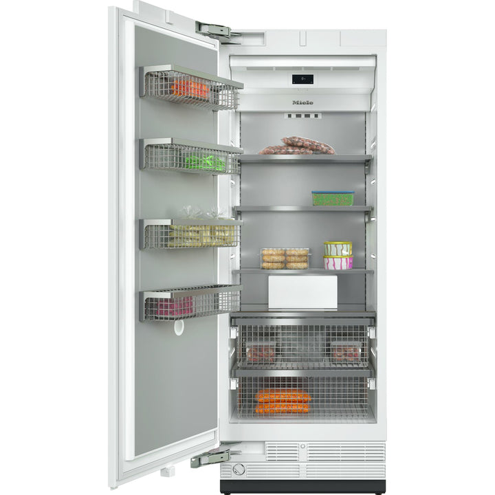 Congelador de columna panelable Miele F 2812 Vi MasterCool con puerta abierta, cestas metálicas, sistema NoFrost y BrilliantLight; foto oficial de estudio sobre fondo blanco